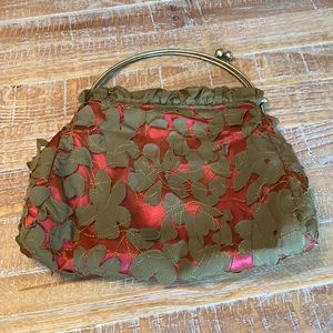 Green, pink, and gold purse